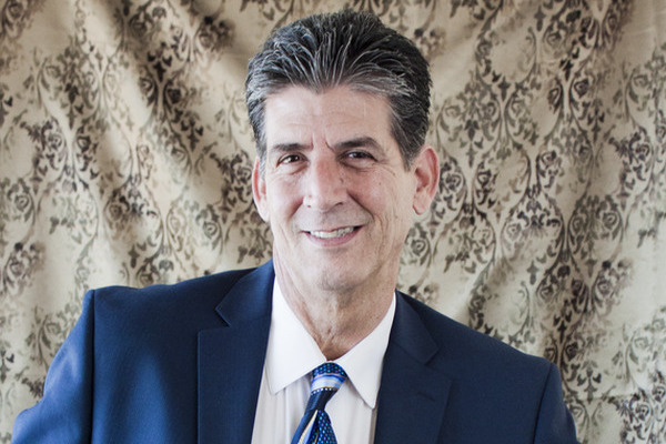 Face photo of Richard C. Karr in a Blue Suit